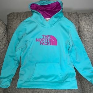 The North Face hoodie. Light blue with dark pink hood.